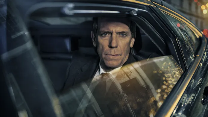 A man in a car with the window down