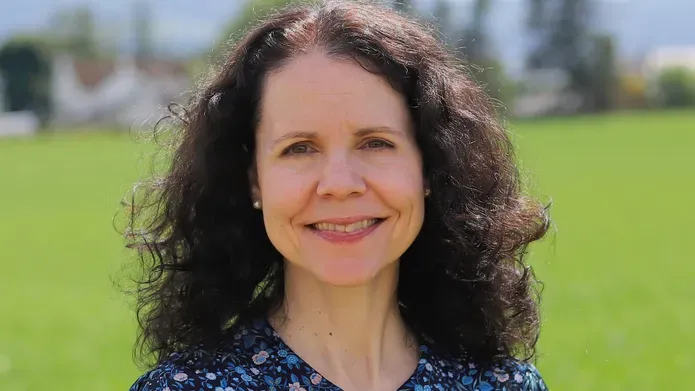 Sarah McKim standing in a park