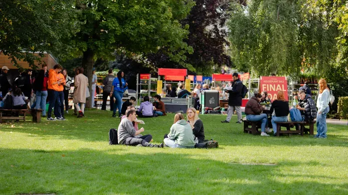 students on campus green