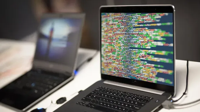 computer with data messages across the screen