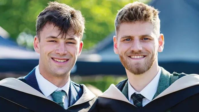 students in graduation robes