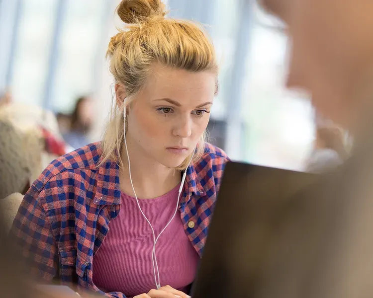 a student on a laptop