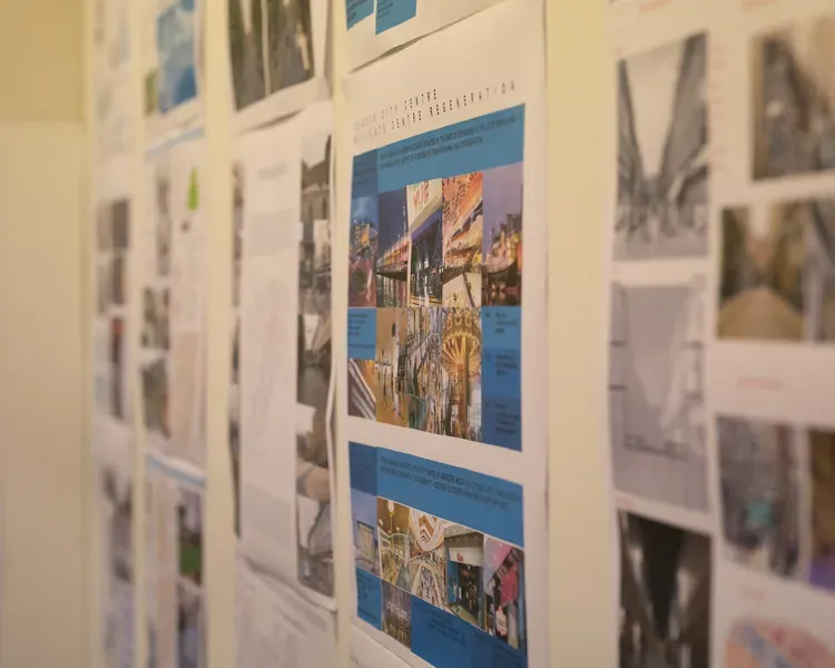 posters of student work on a wall