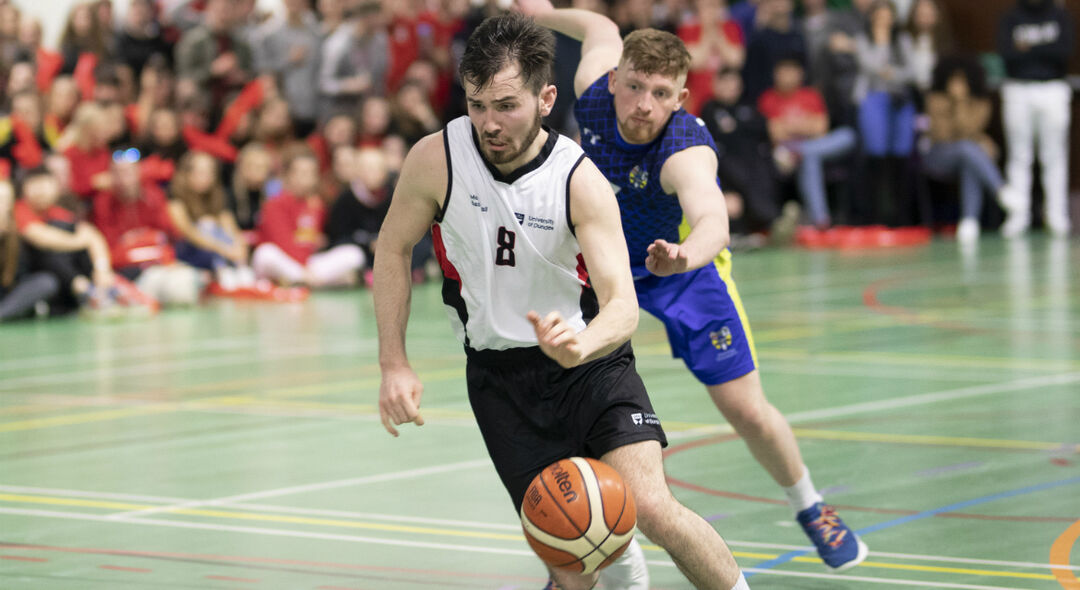 Students playing basketball