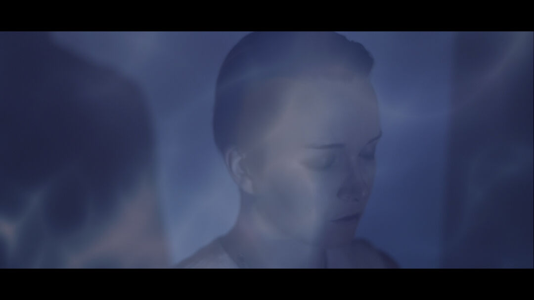 woman's face on a screen
