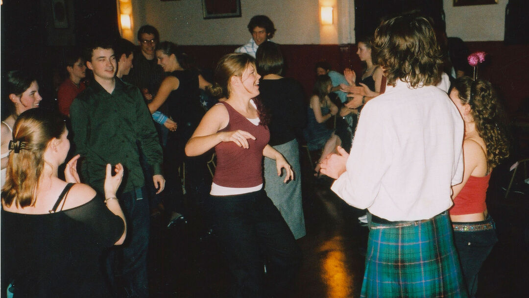 Sheryl dances at a ceilidh with friends.