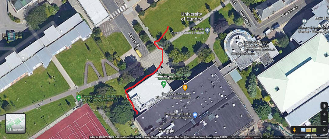 A birds eye view of the DUSA building, with a red line showing the route to the assembly point.