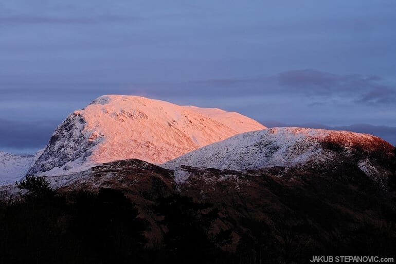 pink light on snow capped mountain